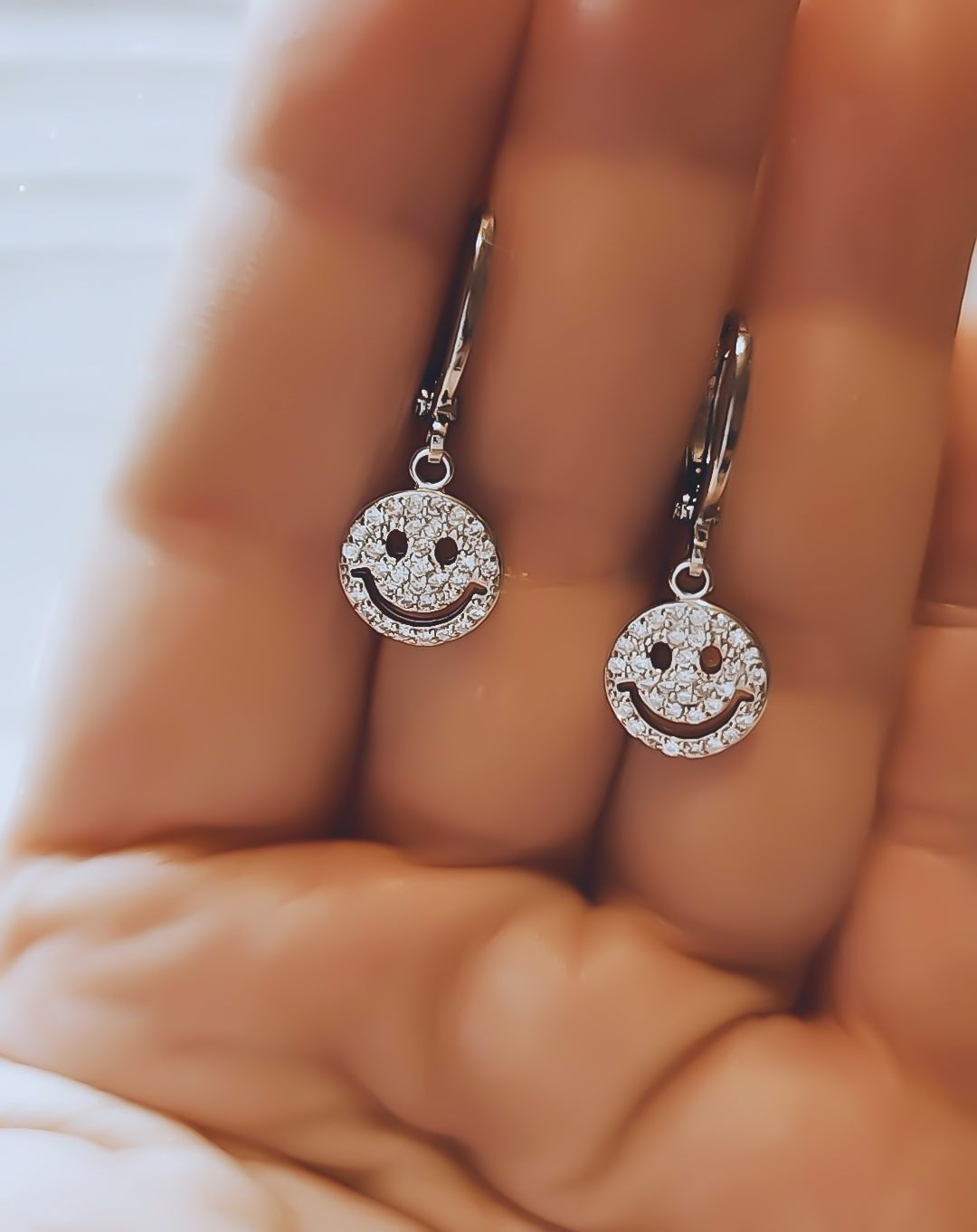 Metal face earrings outlet